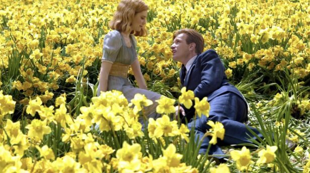 Film still of Alison Lohman and Ewan McGregor sitting in a field of yellow flowers in Big Fish by Tim Burton, 2003